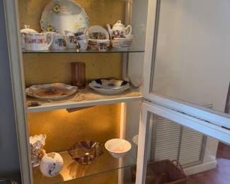 Lighted curio cabinet with nice glass and porcelain items