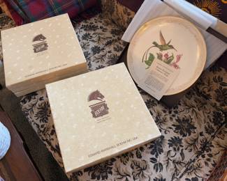 Several Boehm collector plates in the boxes