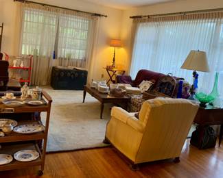 Living room chairs, couch, old trunk, side tables, leather top coffee table,  glass vases and stemware, walking sticks