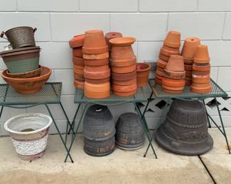 Pots and vintage green metal tables