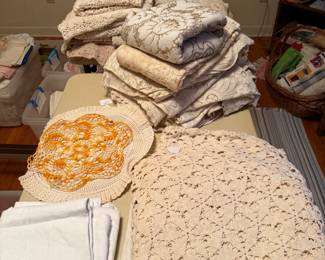 Some of the hundreds of vintage linens