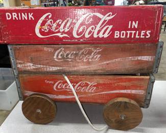 Three Coca-Cola wooden crates