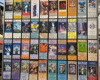 a collection of what appears to be original Super Bowl tickets from Super Bowl one in 1967 up to Super Bowl 40 in 2007
