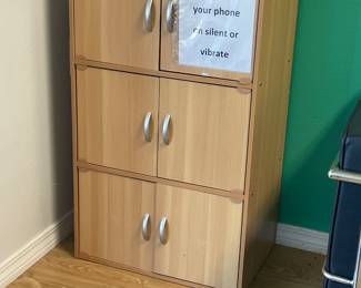 Small shelf with doors