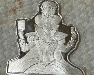 Group of five Allison in Wonderland silver ingots