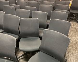 Approximately 70 rolling chairs