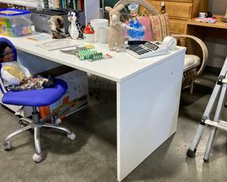 White desk with separate file cabinet, desk chair, toys