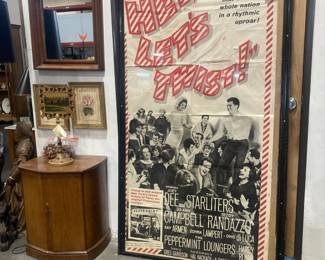 Small cabinet, large "Hey Let's Twist!" framed poster