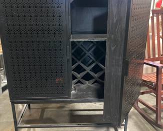 Black metal doors and wood interior Bar