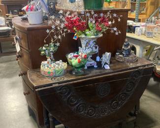 Drop leaf carved table with accessories