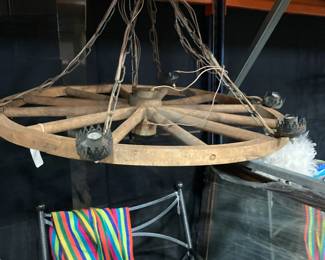 Wagon Wheel Chandelier, Black iron swivel indoor/outdoor chair