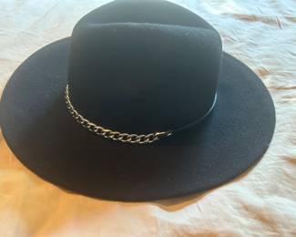 New Michael Kors black ladies brimmed hat w/ silver chain accent trim. $45