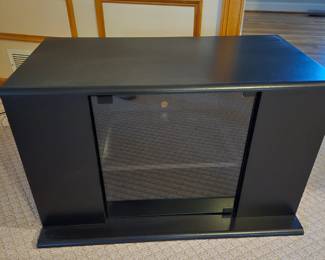 Tv stand, with storage for DVD player, Visa and stage on side for dvds