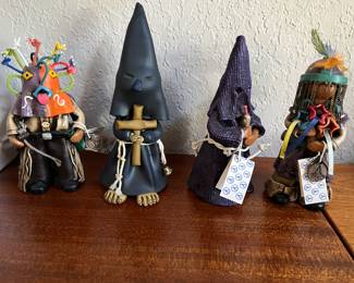 penitent and other figures from Spains Holy Week by Dianto