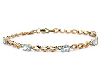 Oval Natural Aquamarine Oval Flat Link Station Bracelet in Yellow Gold