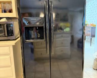 Refrigerator is in great condition - everything works including the ice maker.