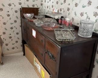 Antique sideboard with a beautify serving pieces