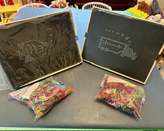 Not one but two Lite Brights include new/unused templates and lots of color pegs with working bulbs