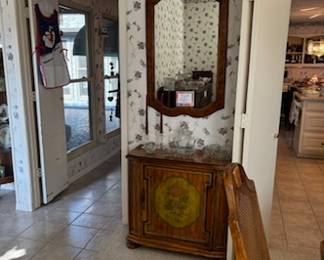 Beautiful small side board and matching mirror can fit in almost all homes and apartments today providing beauty and additional storage!