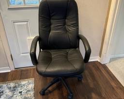 Office chair in excellent condition and a peak at the beautiful 8x10 living room rug