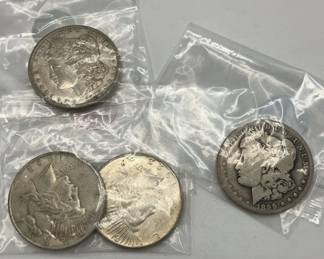 Four Silver Dollar Coins