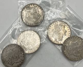 Five Silver Dollar Coins