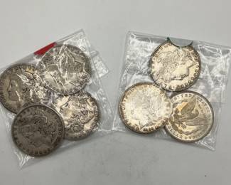Seven Silver Dollar Coins