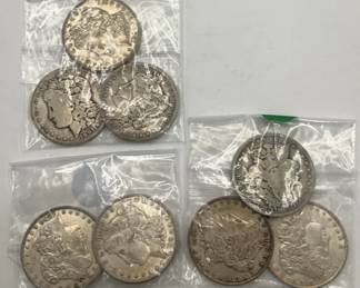 Eight Silver Dollar Coins