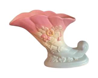 Hull pottery wildflower cornucopia vase with floral motif. Circuit 1946 to 1947.