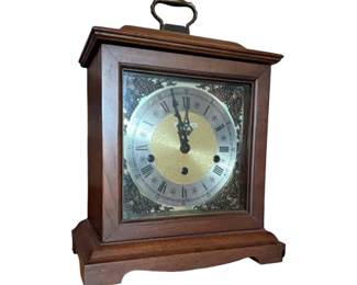 Vintage Howard Miller, mechanical mantle clock with Roman numerals. Circa 1970s.