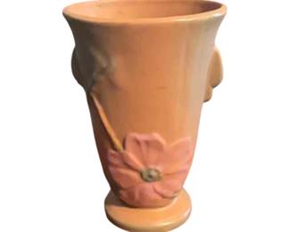 Weller pottery vase with matte pink glaze and floral motif. Circa 1930s to 1940s.