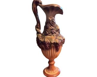 Vintage Arnels ceramic pitcher with grapevine motif and bird handles. Circa mid to late 20th century.