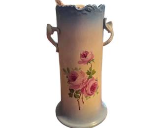 Hand-painted porcelain base with roses and applied handles. Circa early 20th century.
