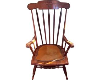 Vintage wooden spindle back rocking chair with carve crest rail. Circuit 1970s.
