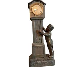 Antique French spelter clock depicting a Dutch boy. Circa 1930s.