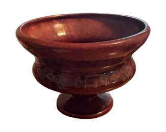 Haeger pottery footed ceramic vase with reddish brown glaze. Circa Mid-20th century.