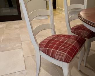 Nichols & Stone French Country painted dining table with wood top and red plaid upholstered dining chairs