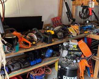 Tools, air compressors, screwdrivers, wrenches, saws, nuts, bolts.
