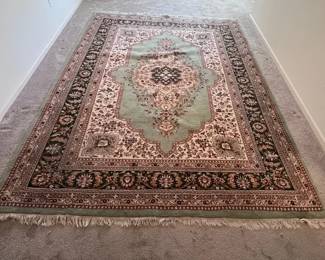 Rug with Green, Light Blue Red Design