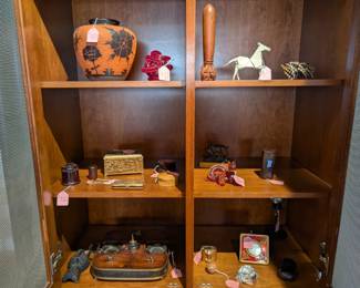 High-end antiques, sculptures, and oddities.