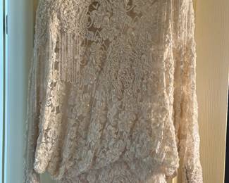 Beautiful beadwork and fringe on wedding dress