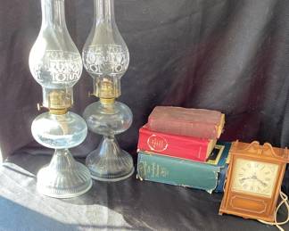 Two Lanterns, Books, And Clock