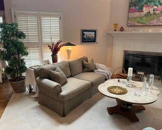 Sofa, marble top coffee table, lamps, misc decor