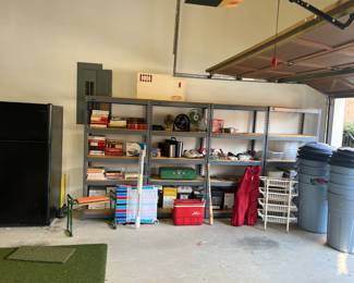 Refrigerator, commercial shelving, garbage bins, misc garage