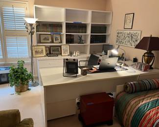 Office desk and shelving, books, framed prints, lamps, misc decor