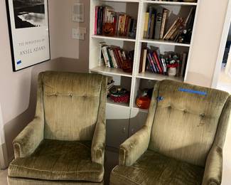 Pair of chairs, bookcases, books, framed poster