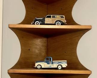 Collection of Die-Cast Model Cars and a Wooden Shelf
