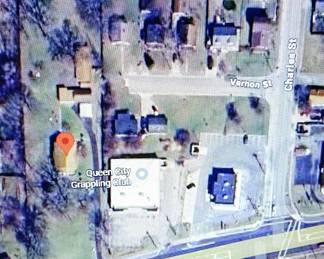 High altitude aerial view of the property