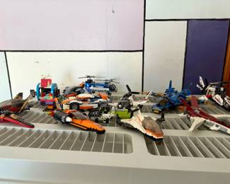 LEGO Vehicles Lot
LEGO City Speed Record Car (set 60178)
LEGO City Satellite Service Mission space shuttle from set 60224.
LEGO Creator 3-in-1 Futuristic Flyer (31086)
LEGO Technic Helicopter (Set 30465)
LEGO Ninjago Destiny's Wing
LEGO City Skater (30568)
LEGO Creator Coffee Cart (set 40488)
LEGO Creator 3-in-1 Sunset Track Racer building set (item number 31089)
LEGO Creator 3-in-1 Cyber Drone (31111)
LEGO Technic Twin-rotor Helicopter
LEGO Ultralight helicopter 42057
LEGO Ninjago Jay's Storm Fighter
LEGO Technic Ultralight Helicopter (Set 42057