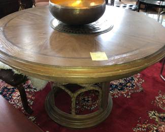 This round Contemporary table has 1 big leaf NOW $250